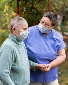 nurse and client out for a walk